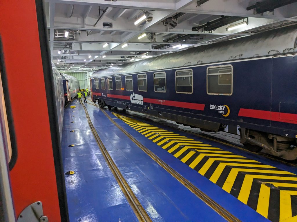 The train on the boat, Italy